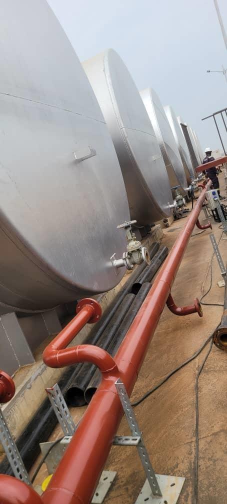 Piping and metering installation at an oilfield tank farm
